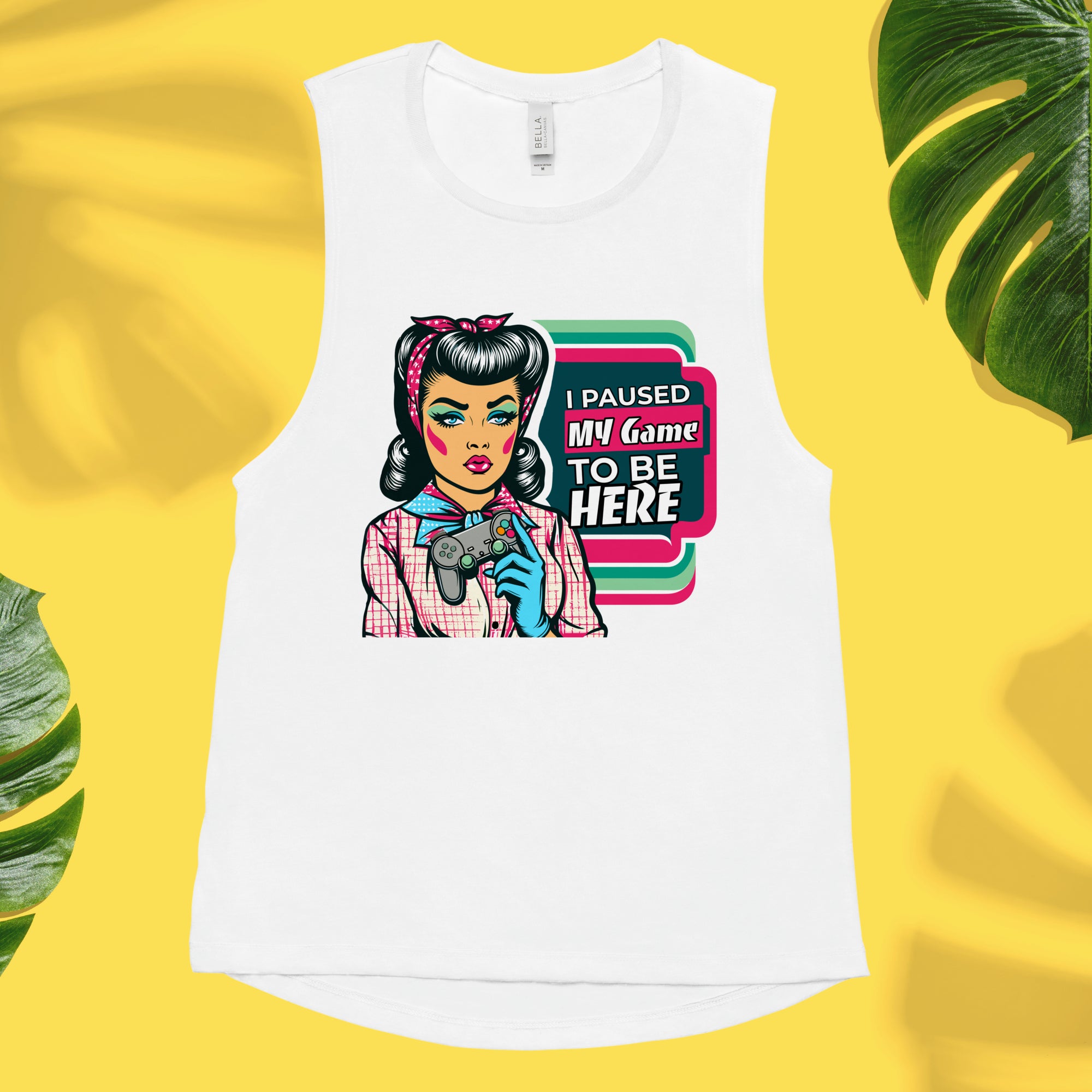 A white muscle tank top with a graphic print of a pin-up girl and the text 'I paused my game to be here' on the front.
