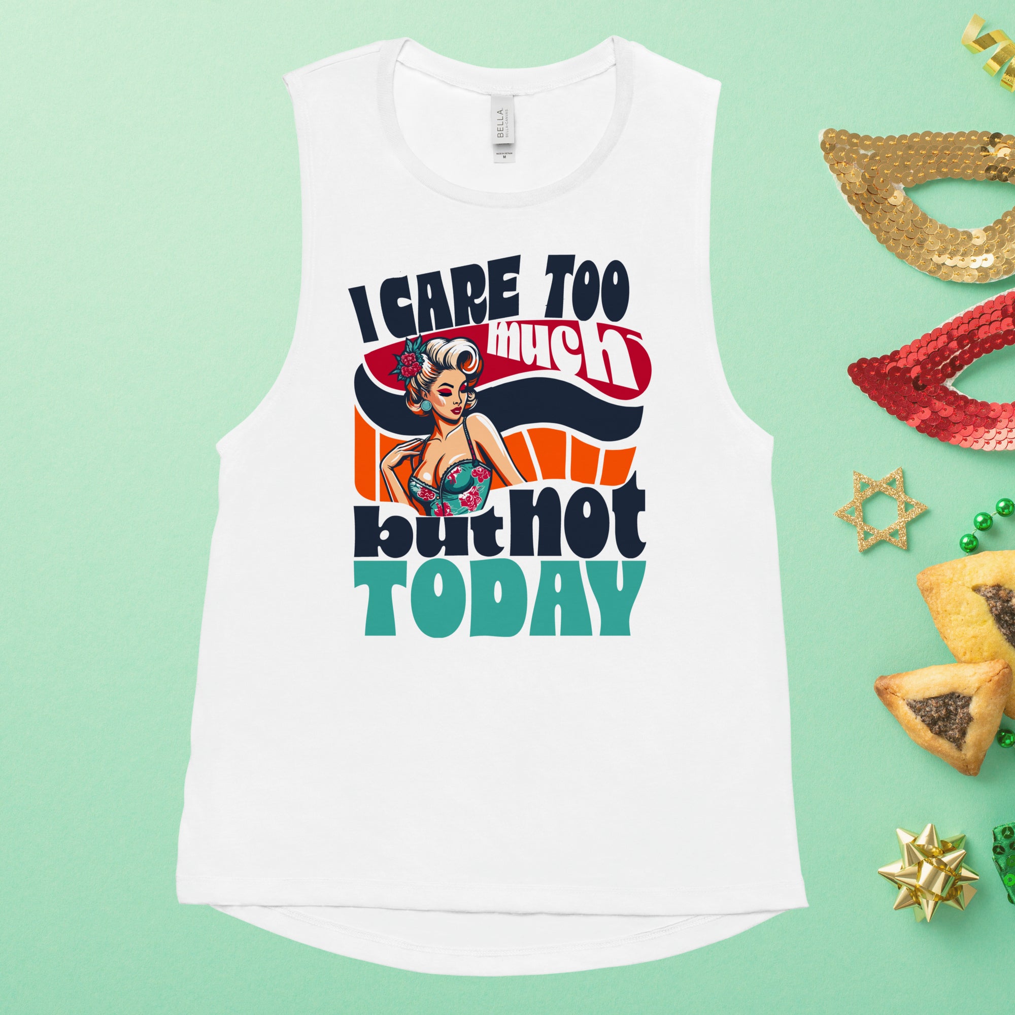 A white ladies' muscle tank top laid flat with text and graphic design, surrounded by party accessories.