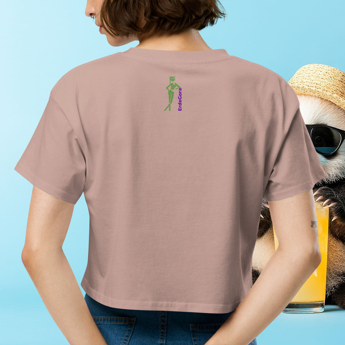 Person wearing a erdegora t-shirt with a logo, standing next to a panda holding a drink.