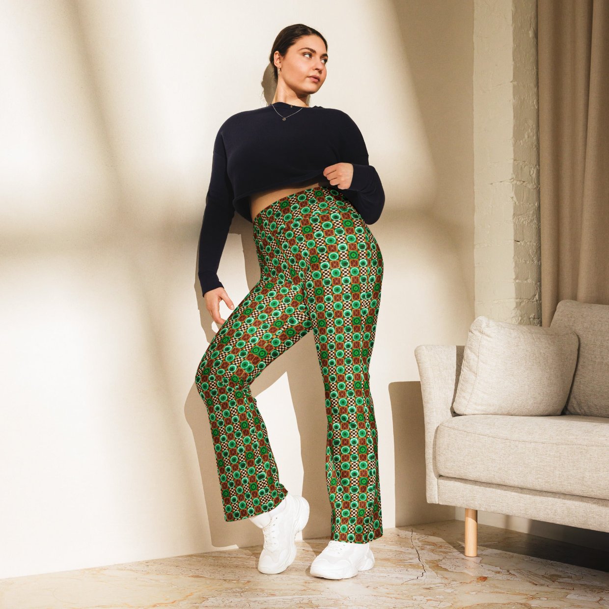 High-rise flared leggings with a vibrant forest race pattern, featuring a high waist and flared bottoms, worn by a model.