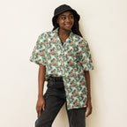 Person wearing Unisex Button Shirt in Floral Escape, featuring a beautiful floral print, lightweight and moisture-wicking material, perfect for hot summer days.