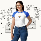 Woman wearing a white and blue baseball shirt with a colorful design, standing against a decorative background with birdcages and birds.