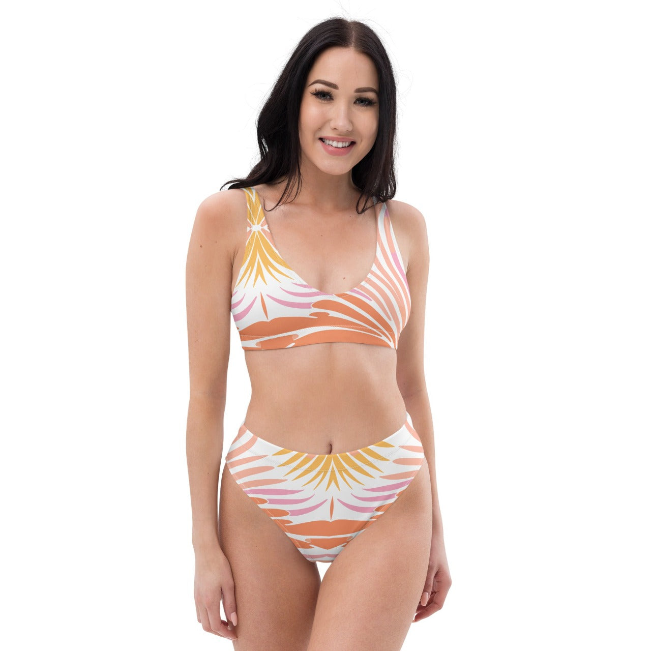 A model exudes summer vibes in the Recycled High-Waisted Bikini Peachy Coral Reef, front view, reflecting the chic and comfortable design perfect for all-day beach lounging.