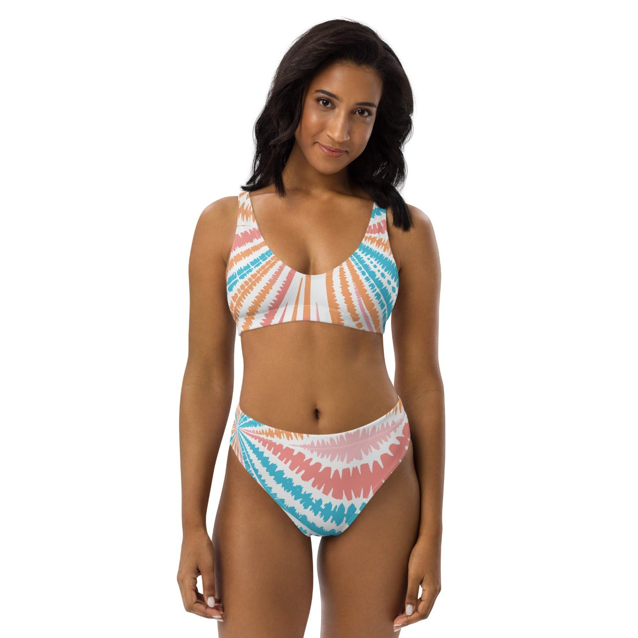 Front view of a model sporting the Recycled High-Waisted Bikini Peachy Twister, highlighting the suit's curve-loving fit and sweet, summery vibe.