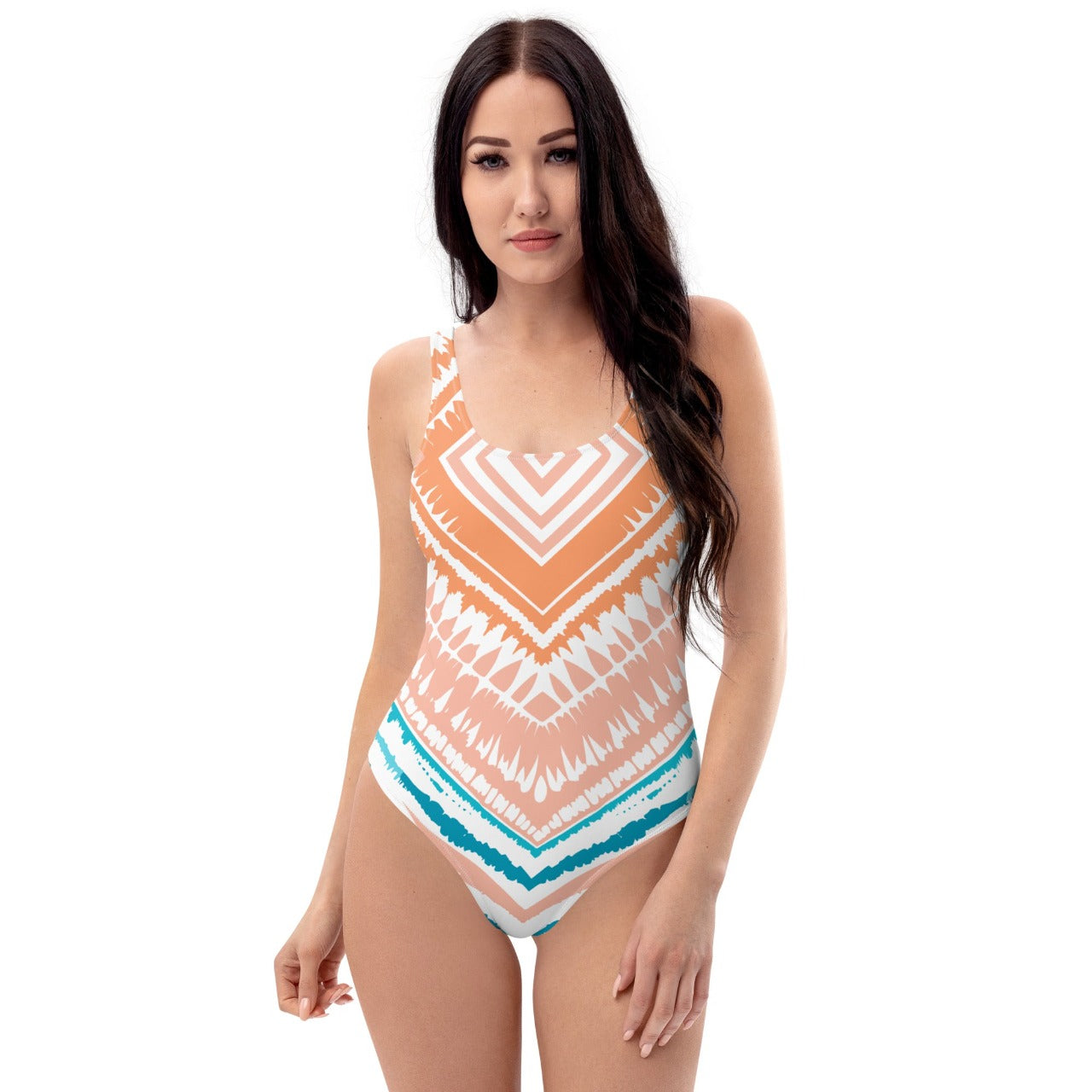 Model facing forward wearing the Peachy Blues Aztec Charm one-piece swimsuit, emphasizing the vibrant print and flattering silhouette.