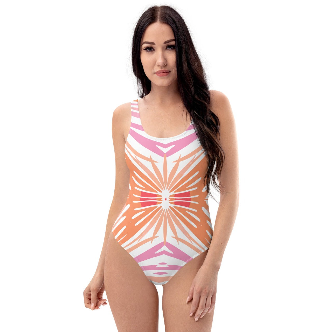 Model showcasing the front of the Peachy Coral Reef one-piece, with emphasis on the fit and dynamic oceanic print.