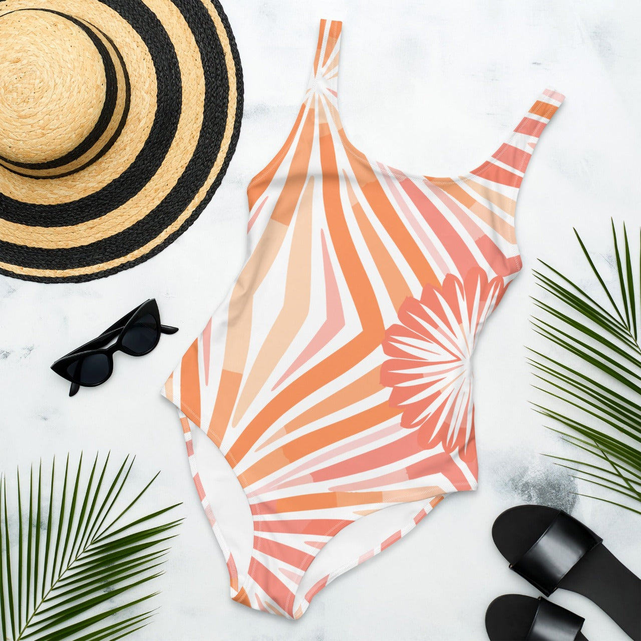 Front view of the 'Peachy Tiger Shark Sleek' one-piece swimsuit, showing off the striped design and modern peach tone.