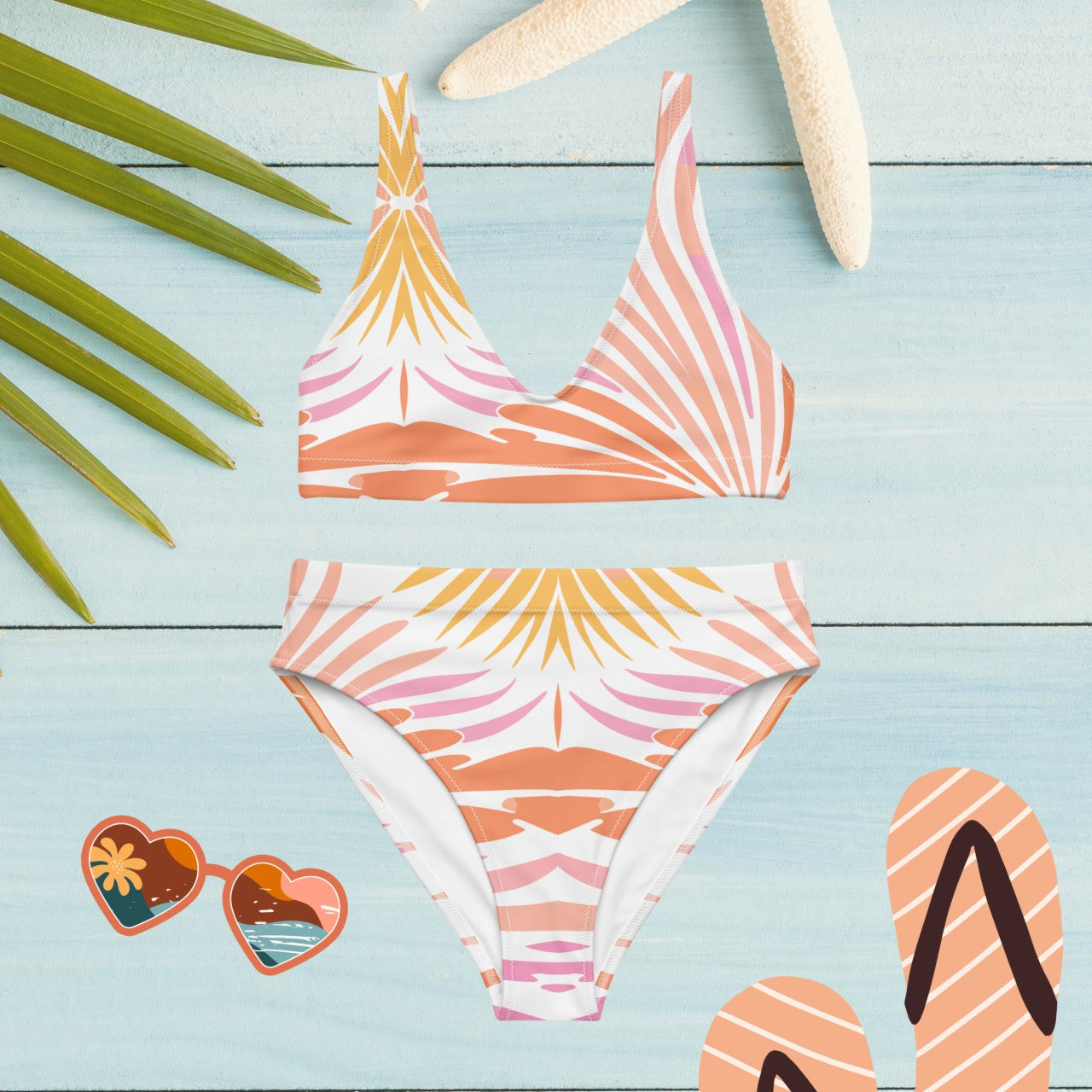 Recycled High-Waisted Bikini in Peachy Coral Reef design displayed in a flat lay, capturing the essence of summer with its fresh white and peach tones, ready for eco-conscious style seekers.