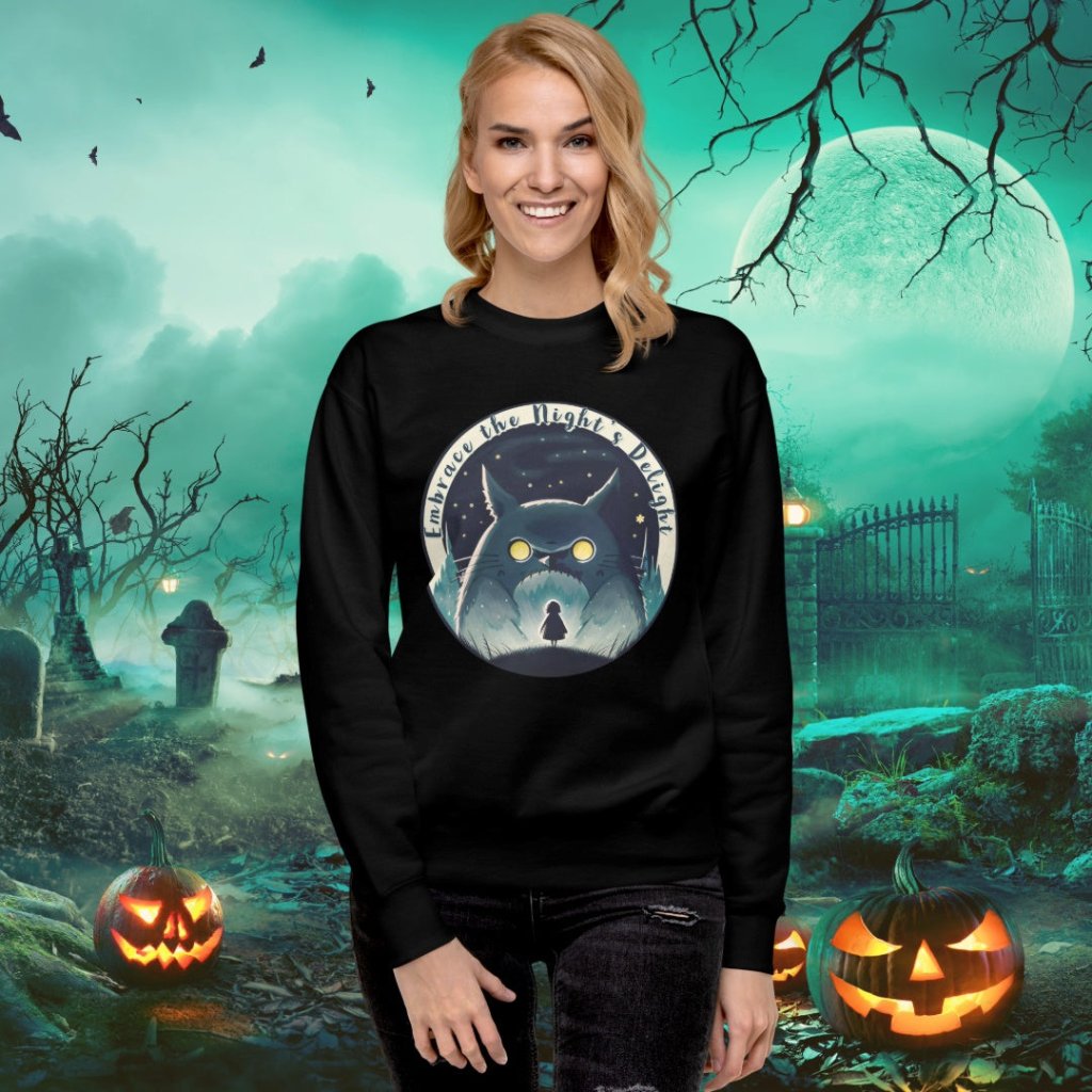 Model wearing a black Erdegora unisex premium sweatshirt featuring the "Embrace the Night's Delight" owl and moonlit night design.