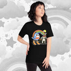 Person wearing a black t-shirt with a colorful graphic design against a starry background