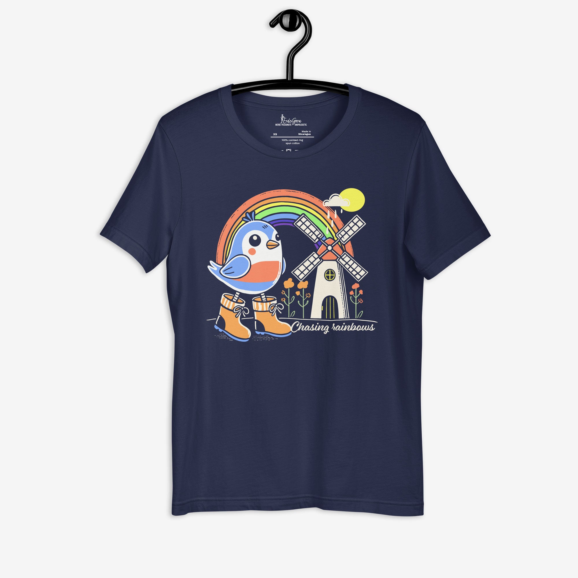 Navy blue t-shirt with a colorful graphic of a bird, rainbow, and windmill on a hanger.