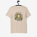 Beige t-shirt with a sun and moon graphic and 'Happiness' text on a hanger against a white background