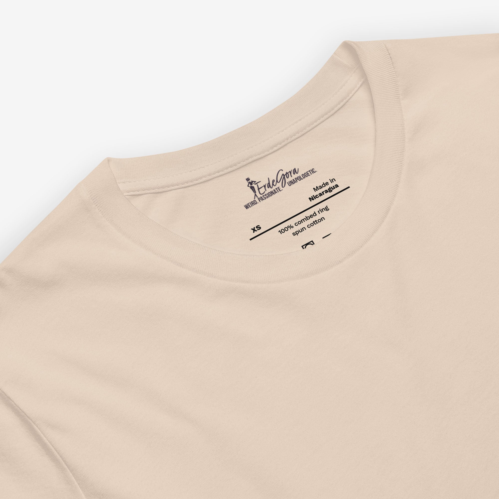 Beige t-shirt with erdegora brand label on a white background