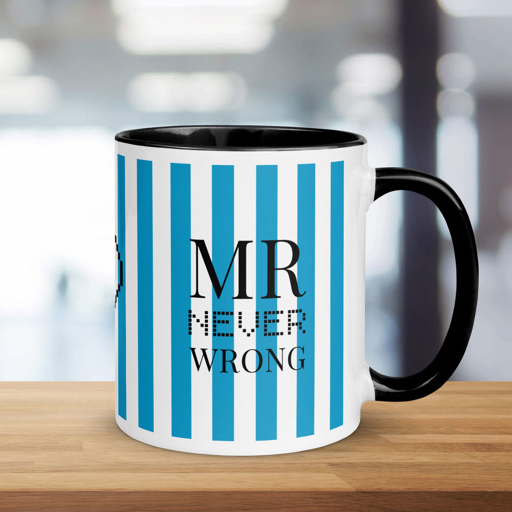 Mug with blue and white striped design and 'MR NEVER WRONG' text on a wooden surface.