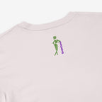 Light pink sweatshirt with a green and purple graphic design logo on the back of the shirt