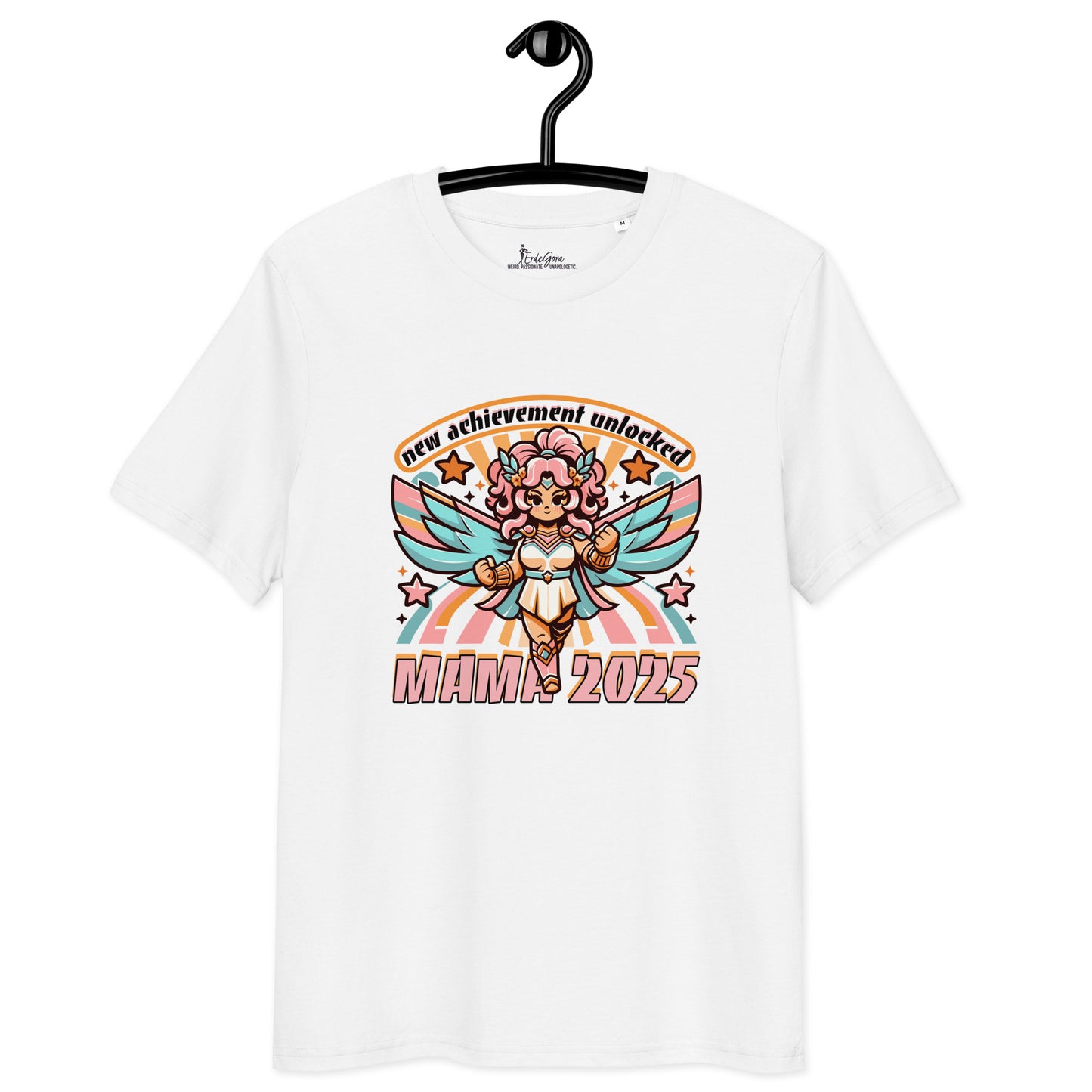 White ErdeGora T-shirt with text 'New Achievement Unlocked: Mama 2025' depicted with a playful, pink and blue, gaming-inspired design featuring a warrior female, hanging on a clothes hanger.