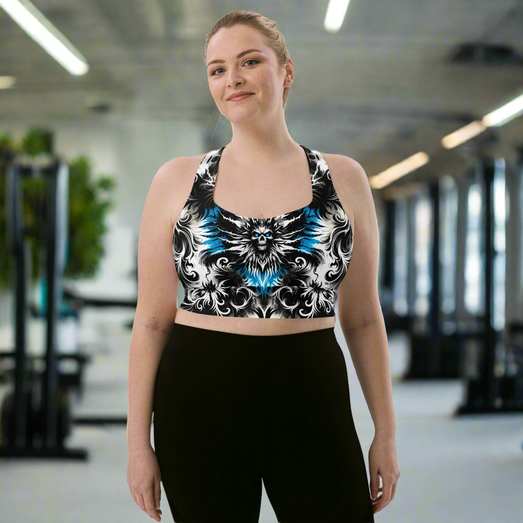 Model wearing the Ghostly Glimmer Longline Sports Bra during a gym session, highlighting its style and functionality. Front view