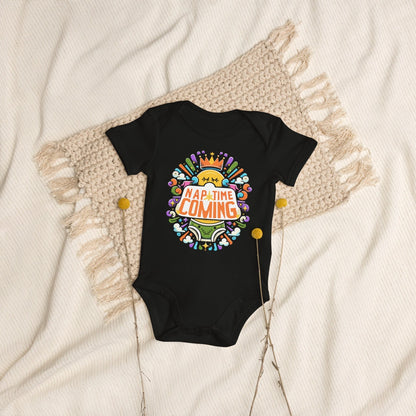 Flat lay organic black baby bodysuit with text nap time coming