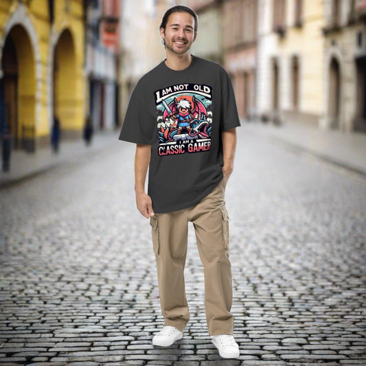 Model sporting the I Am Not Old I Am A Classic Gamer Oversized Faded T-shirt, emphasizing its comfortable oversized fit and retro gaming appeal.