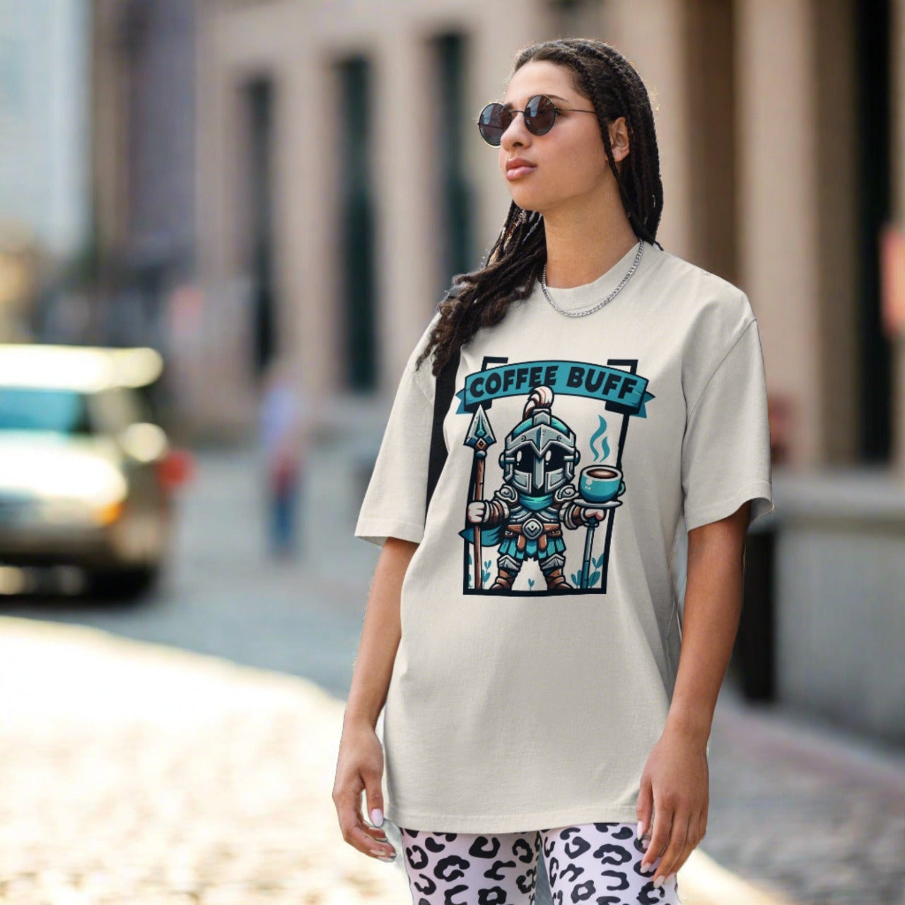 Model wearing Coffee Buff Oversized Faded T-shirt in a casual setting, highlighting its loose fit and vintage appeal.