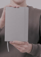 Video demonstration of hardcover bound notebook showing quality binding and pages.