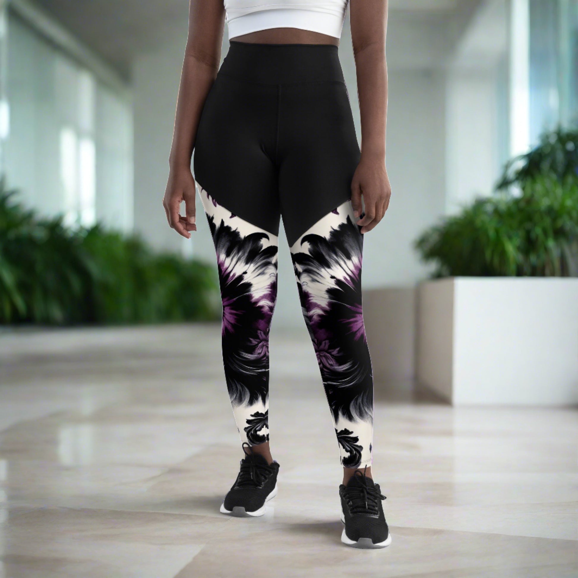 Sports Leggings - Nightshade Pulse adorned with a luxurious floral pattern in purple and black, designed for athletes who demand elegance and performance.