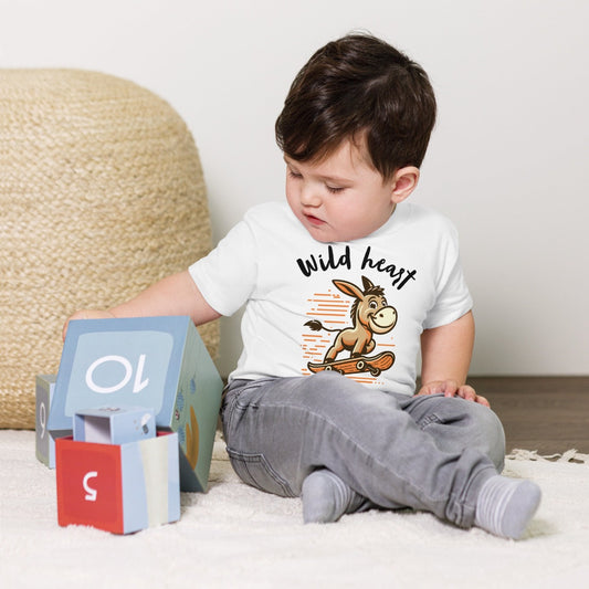 Lively toddler sporting a 100% cotton short-sleeve tee with a playful "Speedy Donkey" print, ideal for showcasing their wild and adventurous spirit.