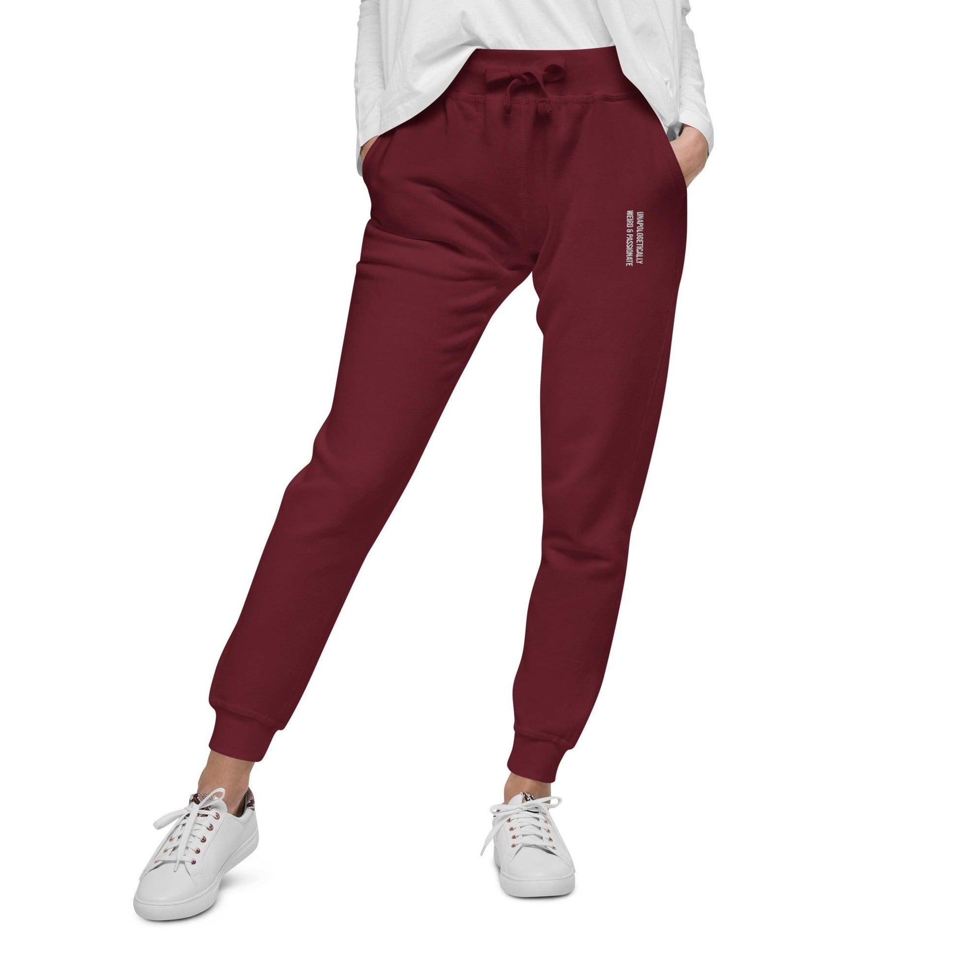 unisex fleece sweatpants shown on a woman, maroon color, front view.