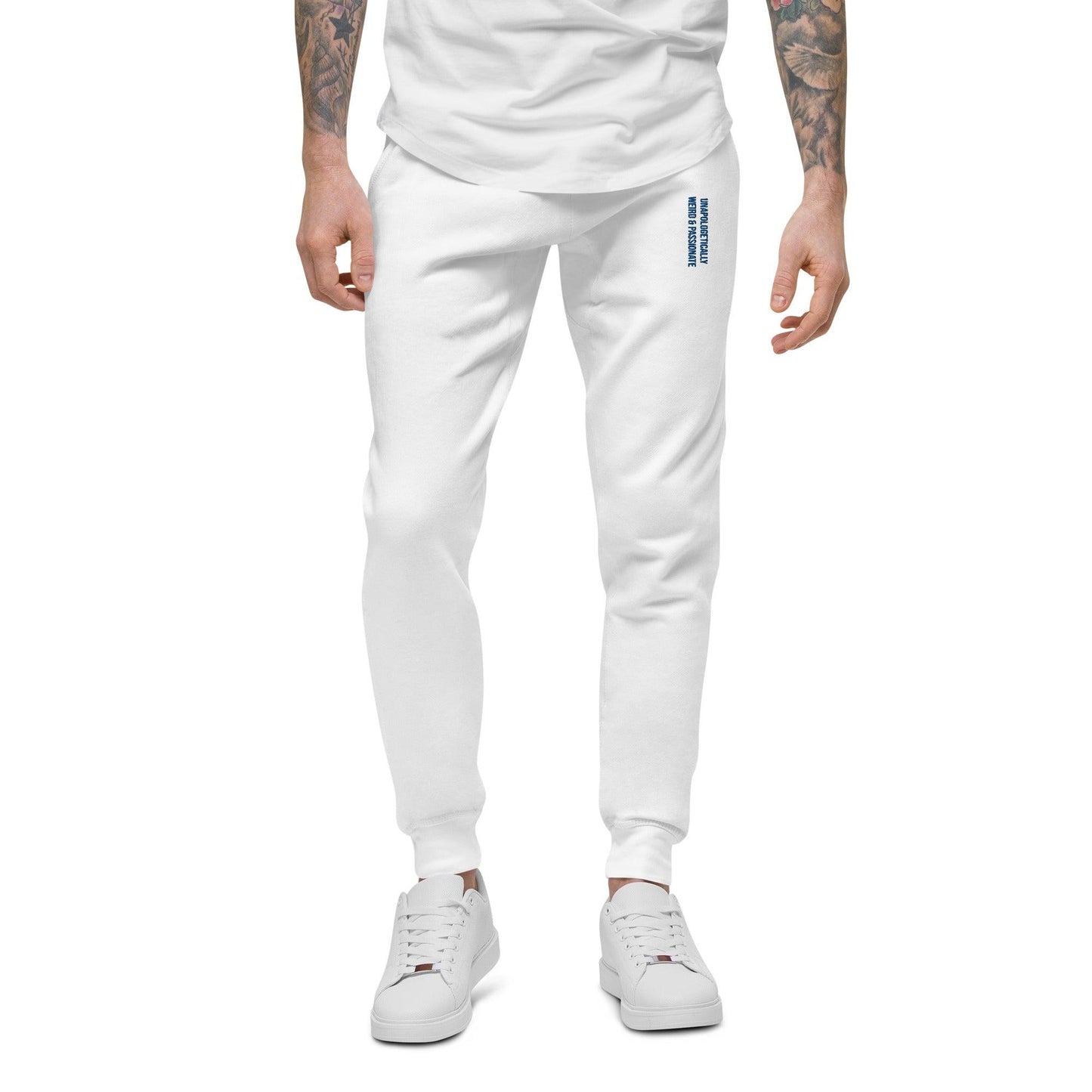 man wearing the white unisex sweatpants with the blue embroidery unapologetically weird and passionate, front view from the bust down