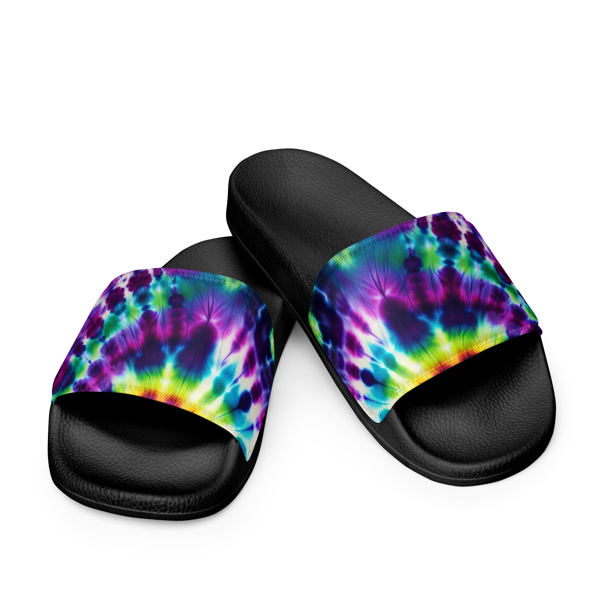 Top view of Women’s Slides in Psychedelic Splash, featuring a vibrant tie-dye pattern on the cushioned upper strap with a contoured and textured footbed.